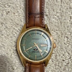 Citizen Gold Case Watch with Green Dial